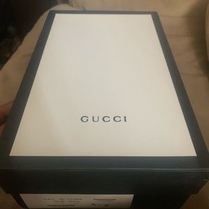 Gucci New Ace leather low‑top sneaker.